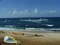Stock Video Wind Surfers at Ho’okipa Beach in Maui Hawaii on a Sunny Day Royalty-Free SD Footage