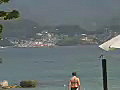 Royalty Free Stock Video SD Footage Zoom Out From Beach and Coastline to Pool and Resort in Grenada