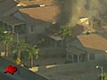 Raw Video: Aircraft Crashes Into House