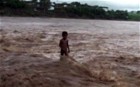 Four-year-old boy rescued from flood waters