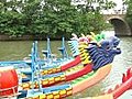 Dragon Boats Moored On Lake Stock Footage