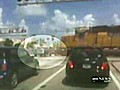 9RAW: Freight train smashes into car