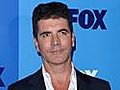 ShowBiz Minute: Cowell,  Warren, Black Eyed Peas