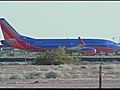 Plane lands with giant hole