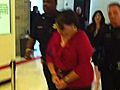 Convicted woman leaves courtroom