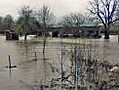 Major flooding cuts off roads and homes