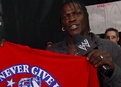 R-Truth visits the merchandise stand