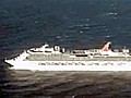 Stricken cruise ship towed home