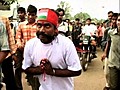 Man Pulls Motorbike With Moustache