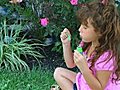 Girl Blowing Bubbles Stock Footage