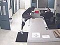 Free Man Attacks Cop Inside Police Station