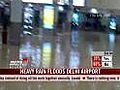 Heavy rain floods Delhi airport