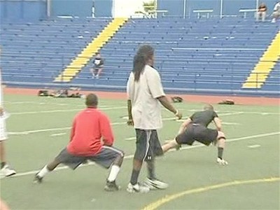 NFL Player Teaches Youth Football Camp