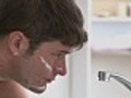 Close up of a man shaving