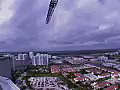 Royalty Free Stock Video SD Footage Pan Right to a Tower Crane at a Construction Project in Miami,  Florida