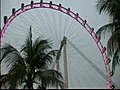 French Spiderman Climbs the Singapore Flyer