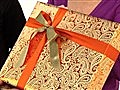 Howdini - How to Tie a Ribbon Onto a Gift Box