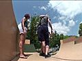 2 guys in 1 pair of shorts try to drop in on a skateboard togeth