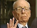 Murdoch turns from defiant to contrite