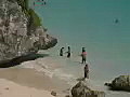 Royalty Free Stock Video SD Footage Zoom Out to From Beach to Coastline and Mayan Ruins at Tulum in Mexico