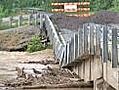 Heavy rain causes bridge collapse