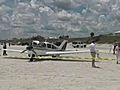 Plane Lands On Crowded Florida Beach
