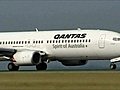 Qantas profits slightly down on year