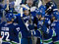 Sedins,  Canucks thump Sharks