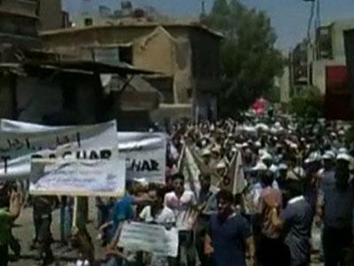 Raw Video: Syrians stage largest protests yet