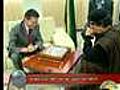 Gaddafi plays chess as war rages