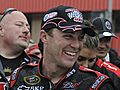 Harvick wins at Fontana on final turn pass