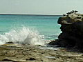 Royalty Free Stock Video SD Footage Scenic View of Coastline,  Waves and Birds Sitting on Rocks on Cancun Beach in Mexico