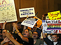 N.Y. same-sex marriage sparks applause,  debate