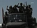 Raw Video: Syrian troops retake border town