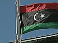 Despite Defections,  Libyan Leader Vows to Fight on