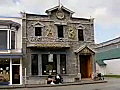 Royalty Free Stock Video SD Footage Zoom Out to an Old Building on the Main Street in Skagway,  Alaska