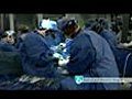 Woman mauled by chimp gets face transplant