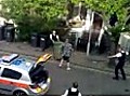 Police tackle machete wielding man with wheelie bin