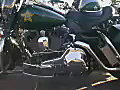 Royalty Free Stock Video SD Footage Pan Up to a Line of Police Motorcycles at the Fun in the Sun Toy Run in Ft. Lauderdale,  Florida in 2003