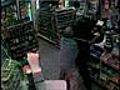 Cashier Fights Off Rifle-Toting Robber