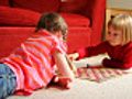 Girls playing board game