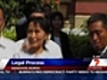 Suu Kyi moves back into politics