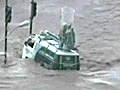 Survivors rescued from hoods of their cars