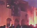 Anti-Gaddafi protesters burn police station