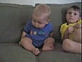 Baby fighting to stay awake