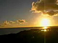 Royalty Free Stock Video SD Footage Static Shot of Blowhole Splashing Water at Sunset in Kauai,  Hawaii