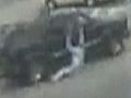 Raw Video: Woman Dragged Through Parking Lot