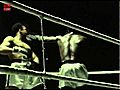 Muhammad Ali and Sounkalo of Mali fighting in boxing ring