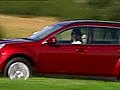 Nice candy red Subaru Outback 2010