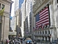 Wall Street slips on housing data